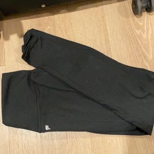 Black fabletics powerhold legging waistband pocket